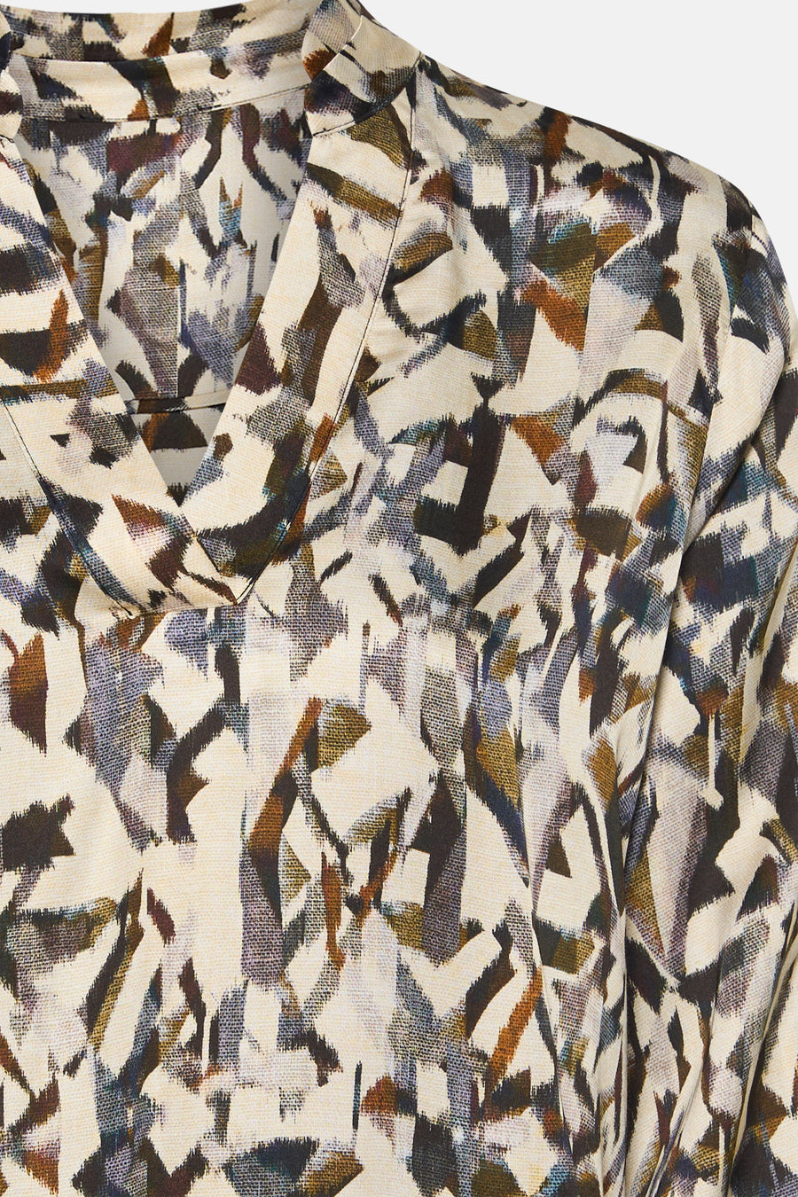 Blouse à manches longues multicolore de CAROLL, avec un motif abstrait et un col en V.

