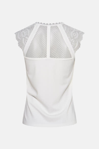 Top blanc de Morgan de Toi avec dentelle aux épaules et dos en tulle à pois.