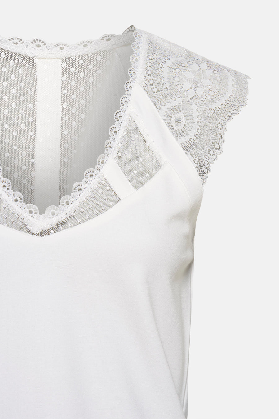 Top sans manches blanc de Morgan de Toi avec dentelle florale délicate et empiècement en mesh à pois.
