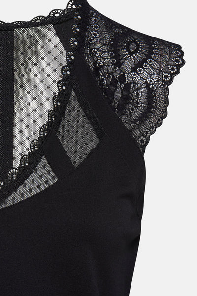 Top noir sans manches de Morgan de Toi avec dentelle florale et empiècements en tulle à pois.