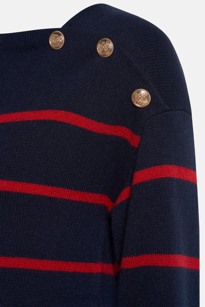 Pull bleu rayé de CAROLL, avec boutons décoratifs dorés sur l'épaule.

