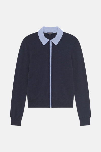 Pull bleu de CAROLL, cardigan boutonné à col chemise bleu clair, en maille lisse.