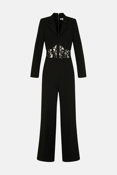 Combinaison noire by Morgan de Toi avec détail de dentelle à la taille et coupe pantalon ample.
