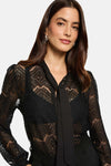 Zwarte blouse met lange mouwen van Morgan de Toi, in bloemenkant, met zichtbare zwarte beha.