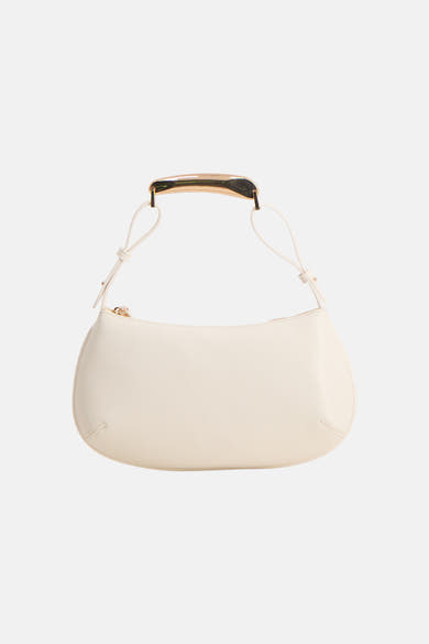 Sac à main blanc de Morgan de Toi, avec une anse rigide dorée et des détails minimalistes.

