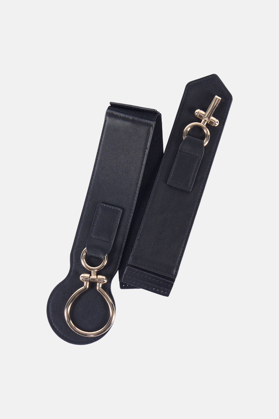 Zwarte riem van Morgan de Toi met decoratieve gouden gespen, op een effen achtergrond.