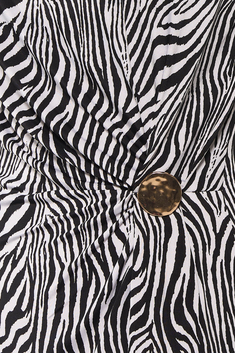 Top sans manches multicolore de Morgan de Toi à motif zébré avec un ornement rond doré.
