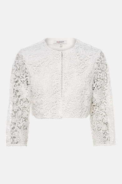 Gilet blanc en dentelle de Morgan de Toi avec manches trois-quarts et motifs floraux.
