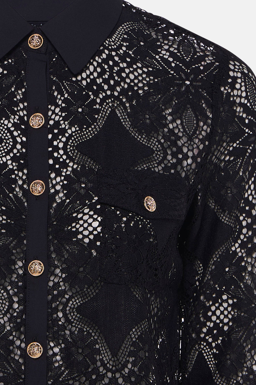 Black long-sleeve lace blouse with gold embellished buttons, collar, and pocket detail, close-up front view