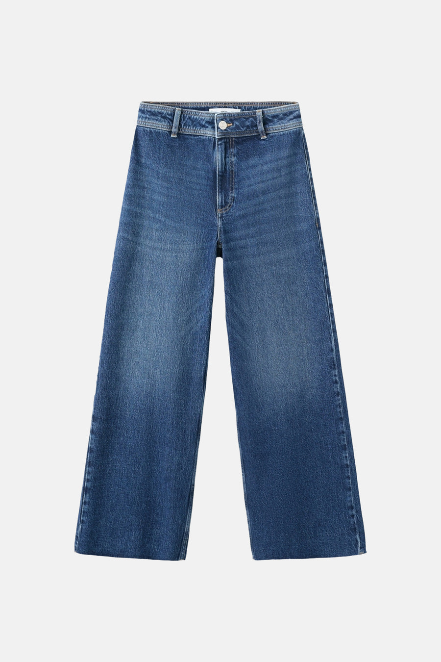 Jean large en denim bleu moyen de MANGO, coupe ample et couleur uniforme.