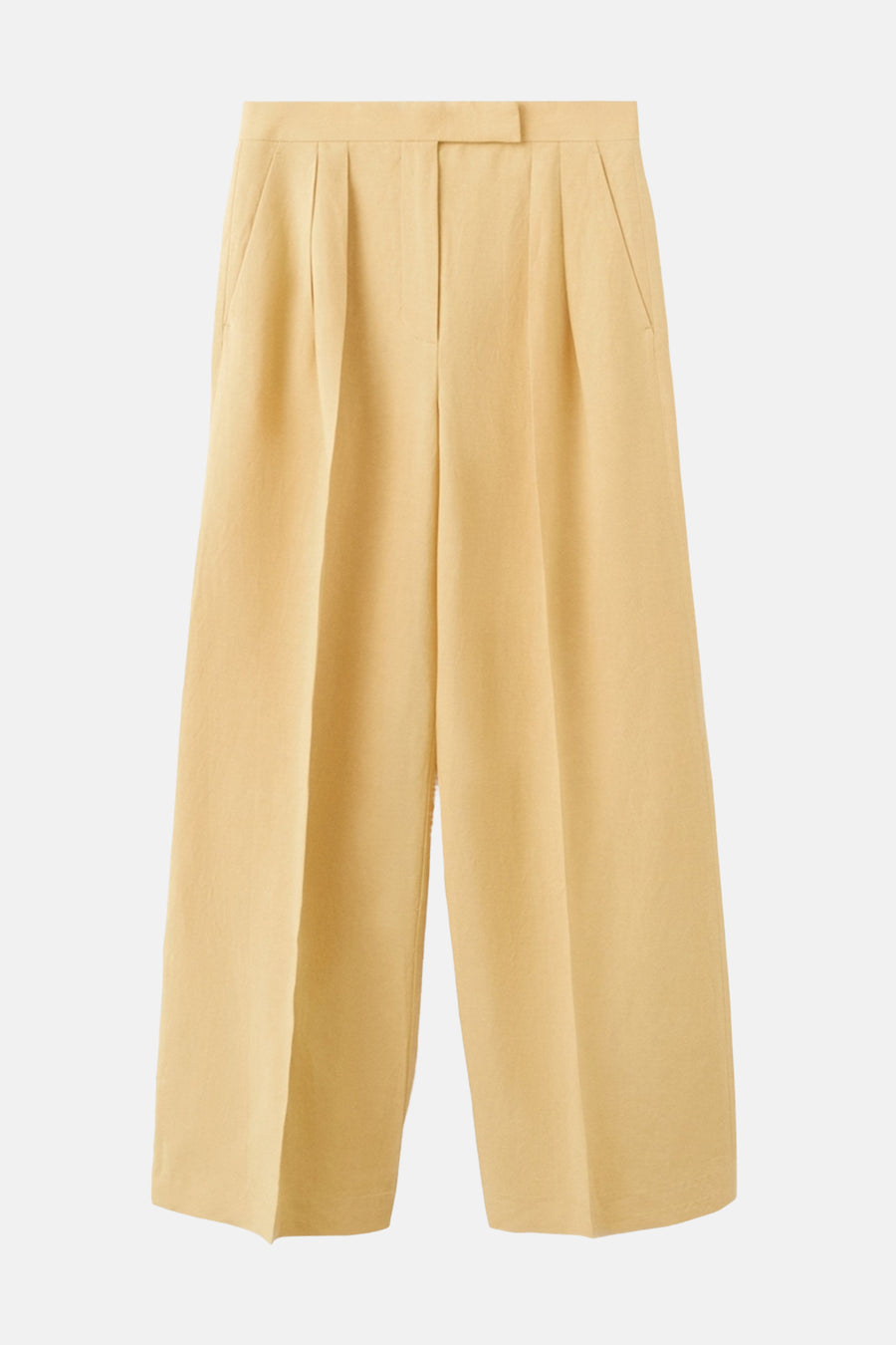 Pantalon jaune de MANGO, coupe ample avec des plis sur le devant et poches latérales.