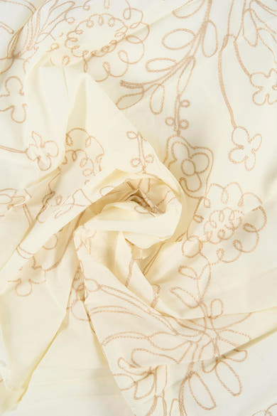 Foulard crème de MANGO avec broderies florales dorées, drapé et froissé.