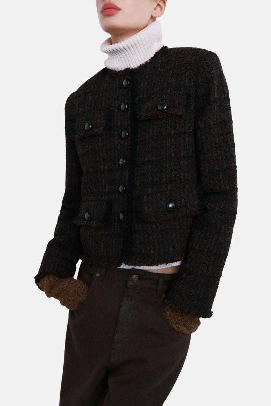 Veste brune en tweed par MANGO, à boutons, poches plaquées à franges et finitions effilochées.