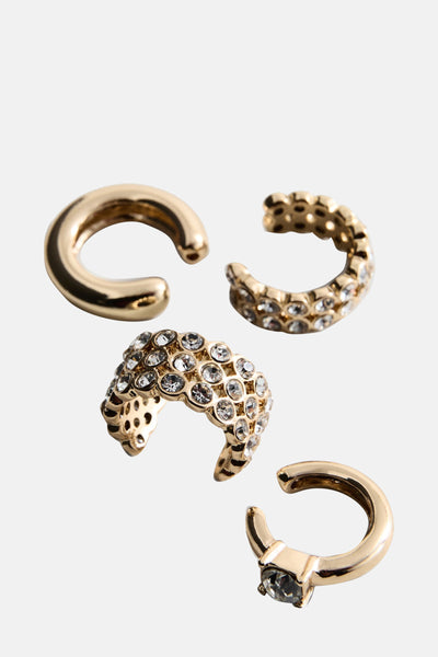 Boucles d'oreilles dorées de MANGO, avec des détails ornementaux de strass scintillants.