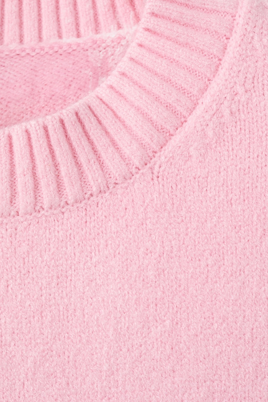 Roze trui met ronde hals van MANGO, in textuurgebreid, met een geribde kraag.