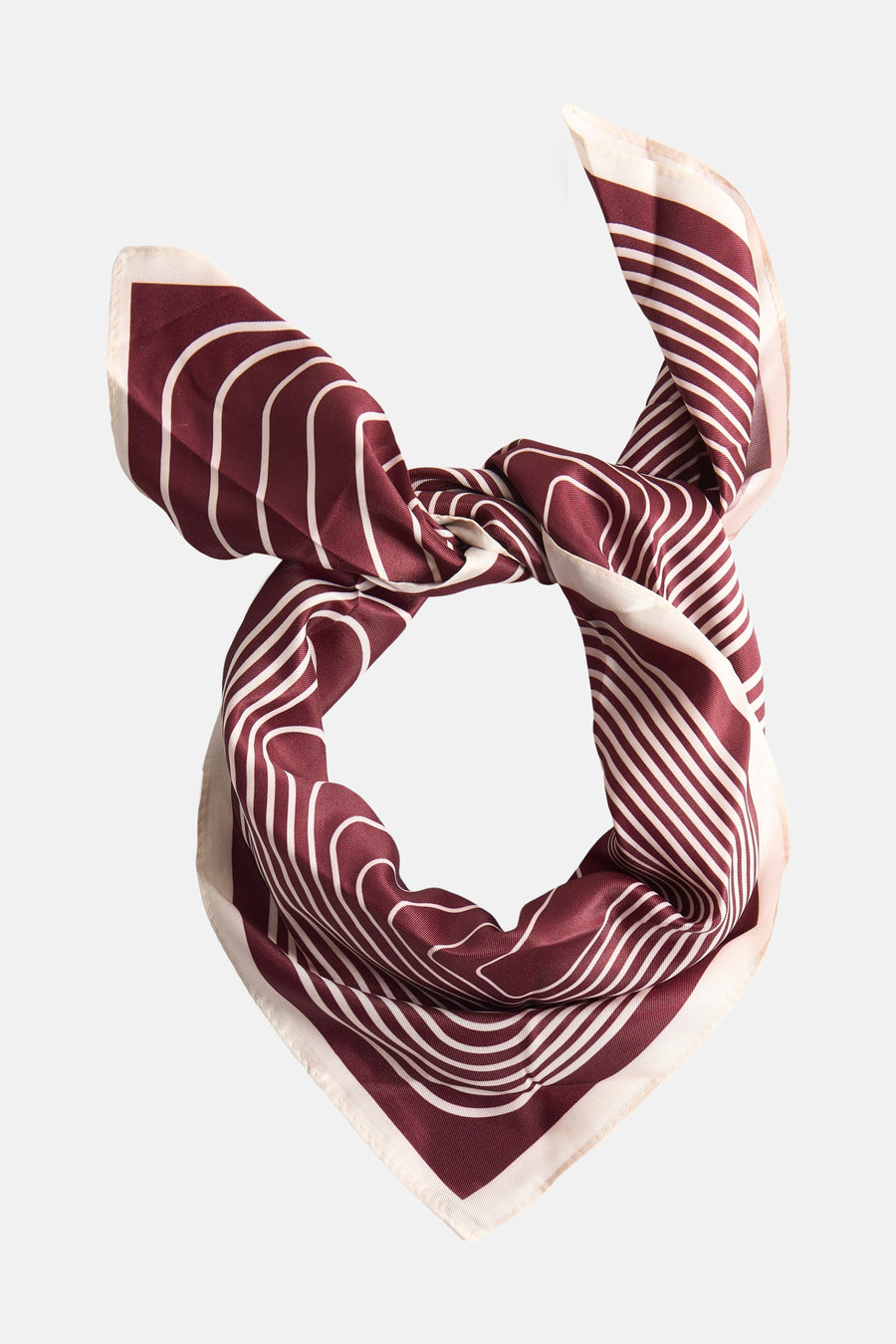 Foulard multicolore de MANGO, noué avec motif rayé blanc sur fond bordeaux.