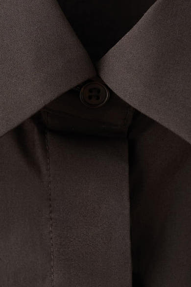 Bruin overhemd met lange mouwen van MANGO, klassieke geknoopte kraag en verticale stikseldetails.