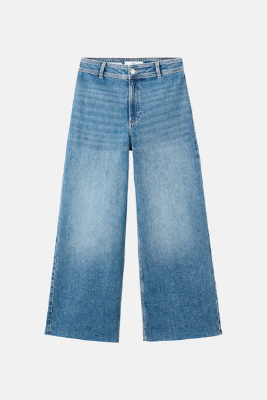 Wijde jeans van middieblauw denim van MANGO, losse pasvorm met een middelhoge taille.