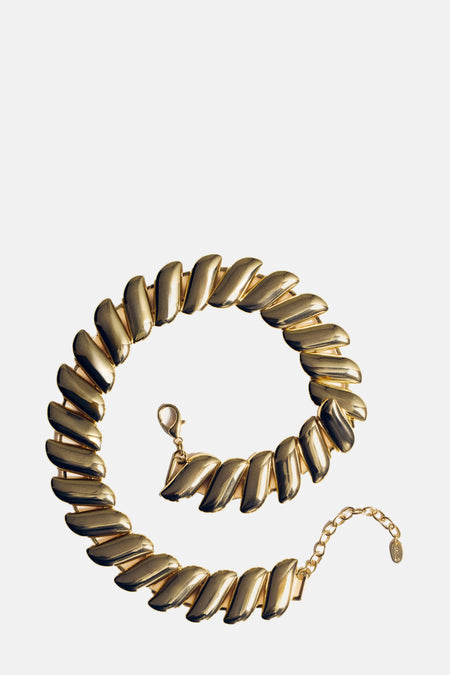 Collier court doré de MANGO en spirale avec une chaîne de rallonge et un fermoir mousqueton.