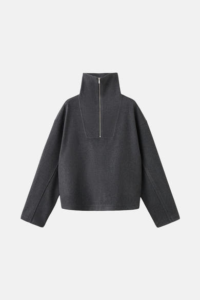 Grijze MANGO sweater met een opstaande kraag met rits en wijde lange mouwen.