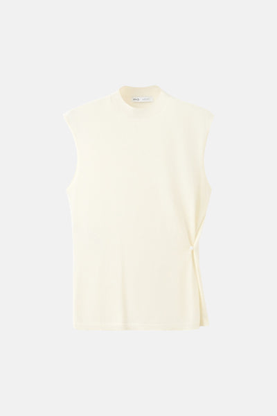Beige mouwloze top van MANGO, met een strikdetail aan de zijkant.
