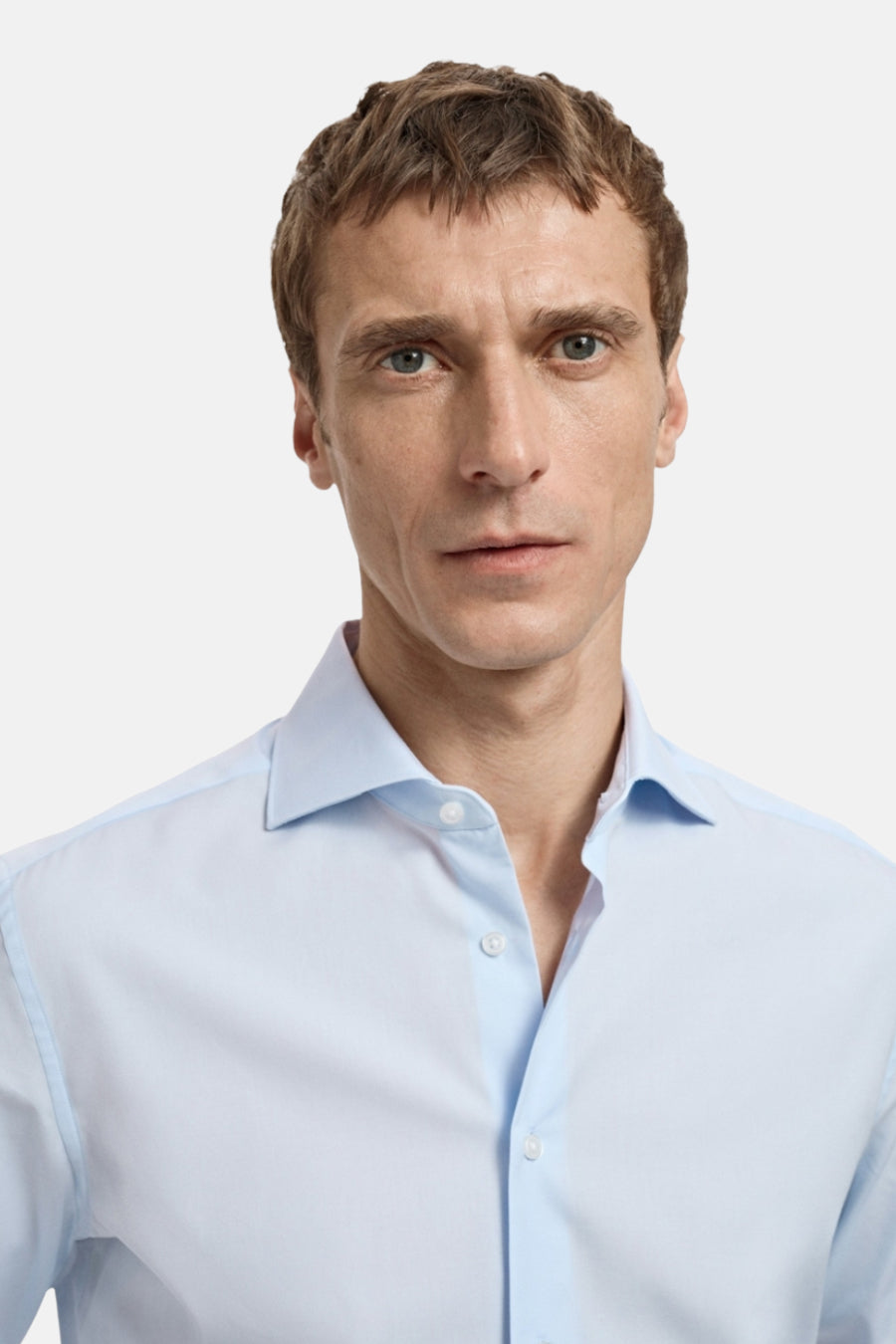 Blauwe blouse met lange mouwen van MANGO, met een klassieke pasvorm en een geknoopte kraag.