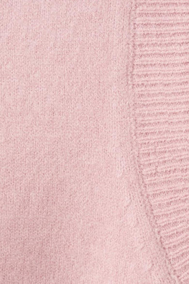 Roze tanktop van MANGO, met een zachte textuur en een subtiel geribbeld patroon.