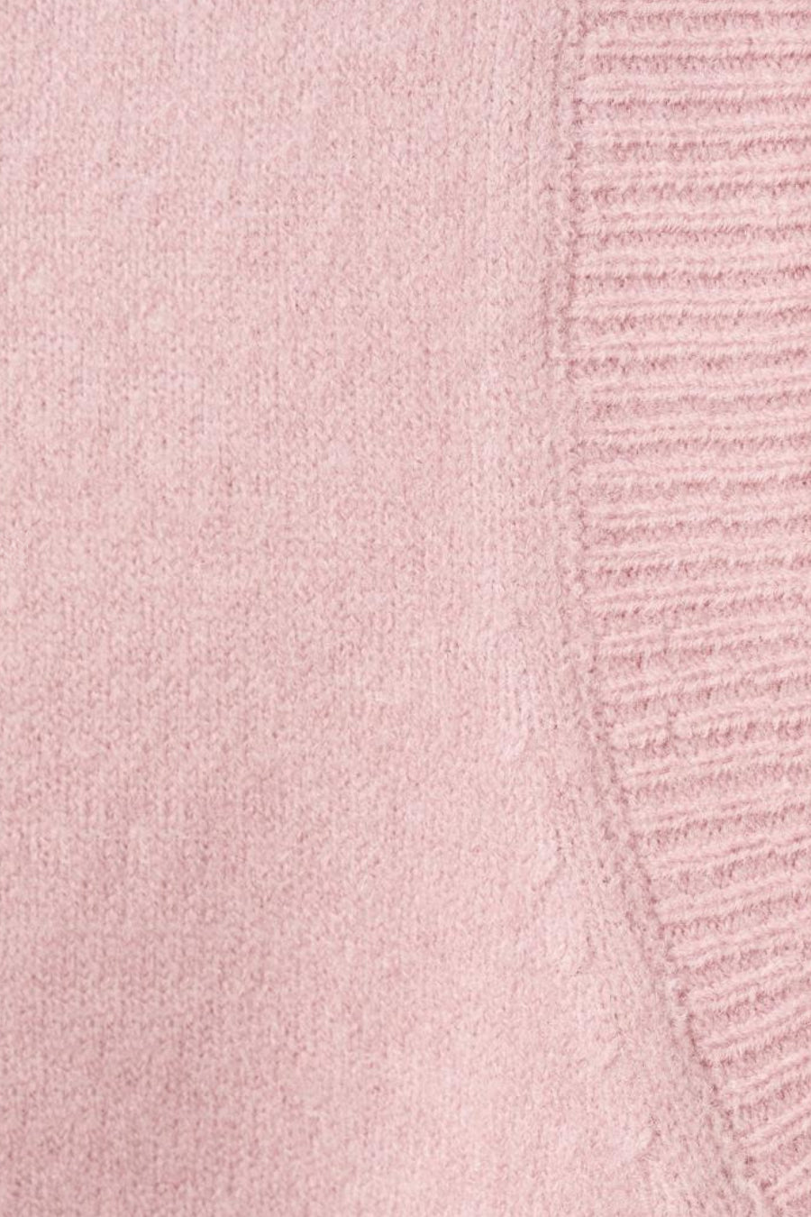 Roze tanktop van MANGO, met een zachte textuur en een subtiel geribbeld patroon.