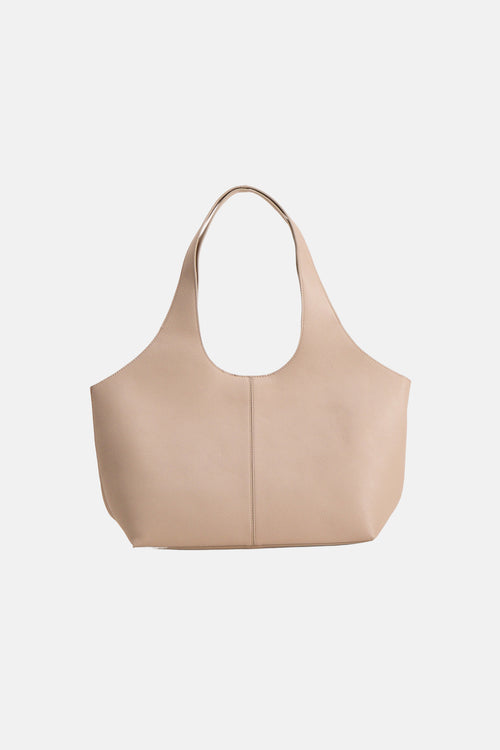 Sac à bandoulière beige de MANGO, avec texture grainée et anses courtes.

