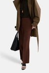 Bruine broek van MANGO, met metalen haaksluiting en ritssluiting.