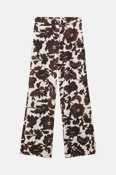 Multikleurige broek van MANGO, met bruin bloemenpatroon op een gebroken witte achtergrond, rechte pasvorm.