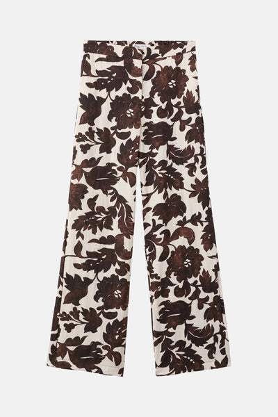 Pantalon multicolore de MANGO, à motif floral marron sur fond écru, coupe droite.