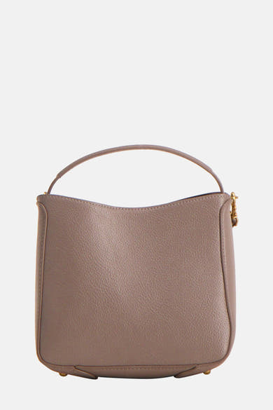 Sac à bandoulière beige de MANGO, avec poignée arrondie et finitions minimalistes.