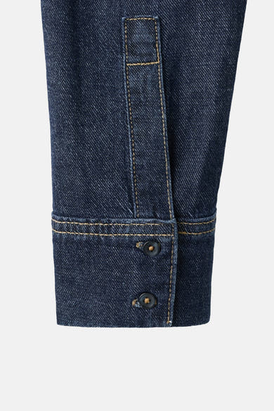 Denim blouse met lange mouwen van MANGO, met knoopsluiting en manchetten met knopen.