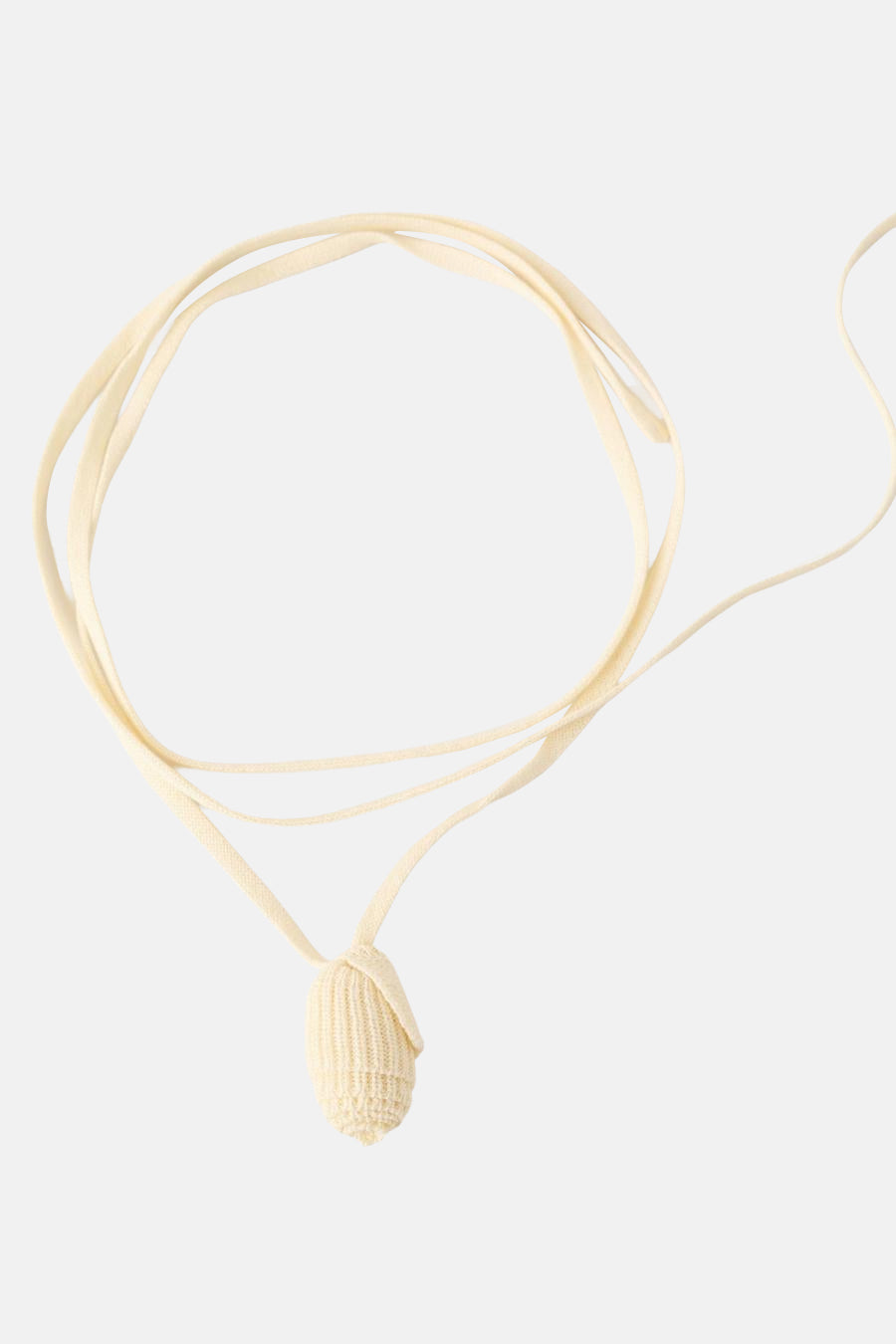 Gele trui van MANGO met een crèmekleurig gebreid detail aan een lang koord.