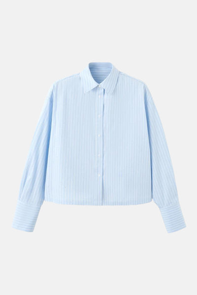 Blauwe gestreepte blouse met lange mouwen van MANGO, met knopen en een relaxte pasvorm.