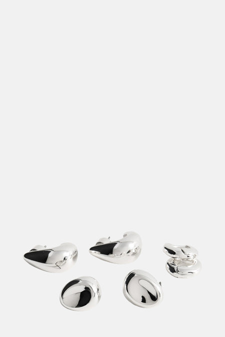 Boucles d'oreilles argentées de MANGO, pièces de différentes formes avec une finition lisse et brillante.
