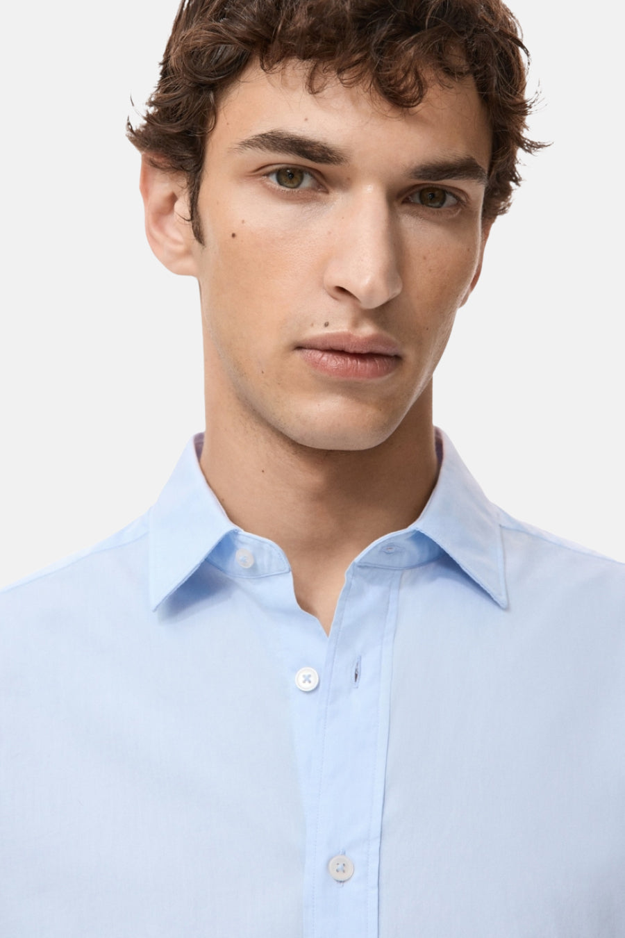 Blauwe blouse met lange mouwen van MANGO, van katoen, met een knoopsluiting.