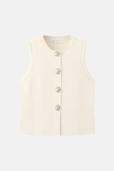 Beige mouwloos vest van MANGO, met ajourdetails en decoratieve knopen.