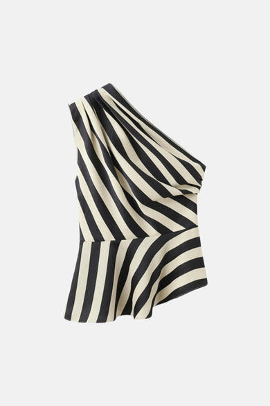 Multikleurig mouwloos bloesje van MANGO, met zwarte en crèmekleurige strepen, asymmetrische pasvorm.