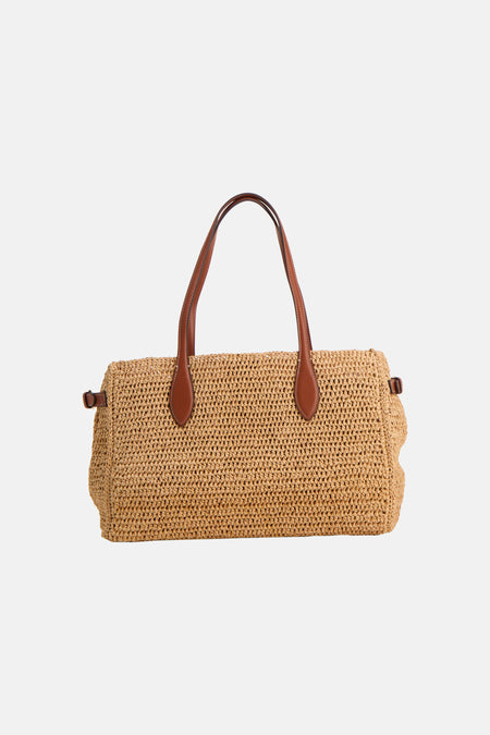 Sac à bandoulière beige de MANGO, en paille tressée avec des anses marron en similicuir.
