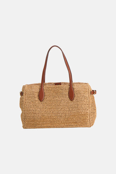 Sac à bandoulière beige MANGO, avec anses en cuir marron, en paille tressée et détails dorés.