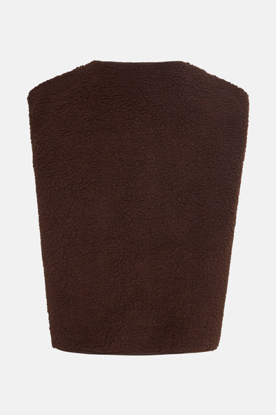 Gilet marron en tissu bouclé de Terra di Siena, montrant une texture douce et uniforme.
