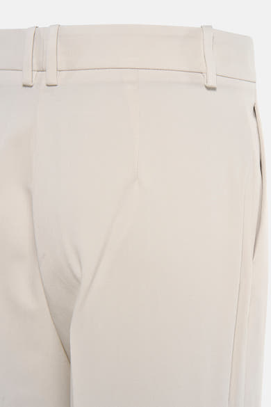 Beige kostuumbroek van MANGO, taille met riemlussen.