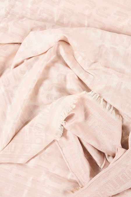 Foulard beige de LIU JO, avec un motif subtil ton sur ton et des franges délicates.
