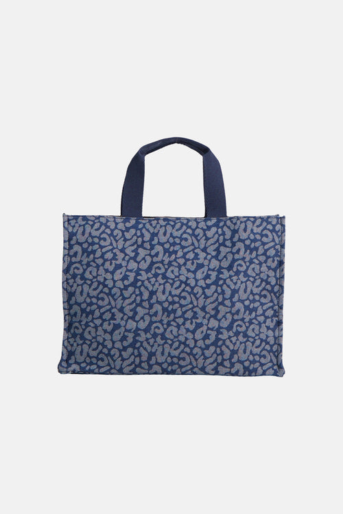 Sac à main bleu de LIU JO, avec un motif léopard gris et une anse double.