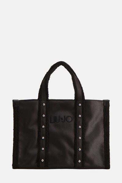 Sac à bandoulière noir de LIU JO avec des finitions en fausse fourrure et des rivets argentés.