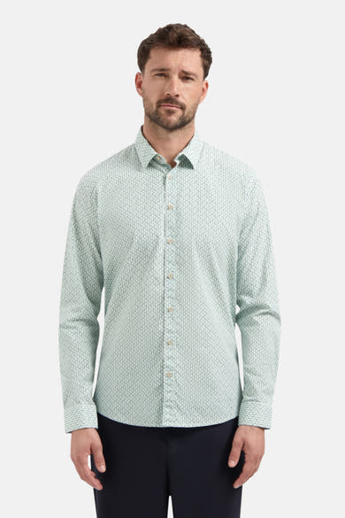Chemise à manches longues bleue de NO EXCESS, à motif texturé sur fond blanc.