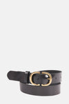Ceinture noire en cuir de Legend, boucle dorée en forme de C, enroulée sur fond uni.
