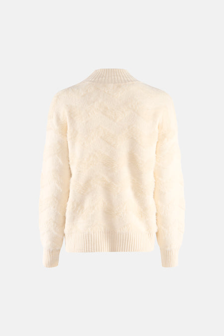 Beige coltrui van Terra di Siena, met donzige textuur in visgraatpatroon.